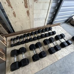 New pair of 5,10,15,20,25,30,45,50,55 and 60lb rubber dumbbells NEW IN BOX $630
