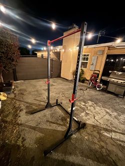 Squat rack with pull up bar