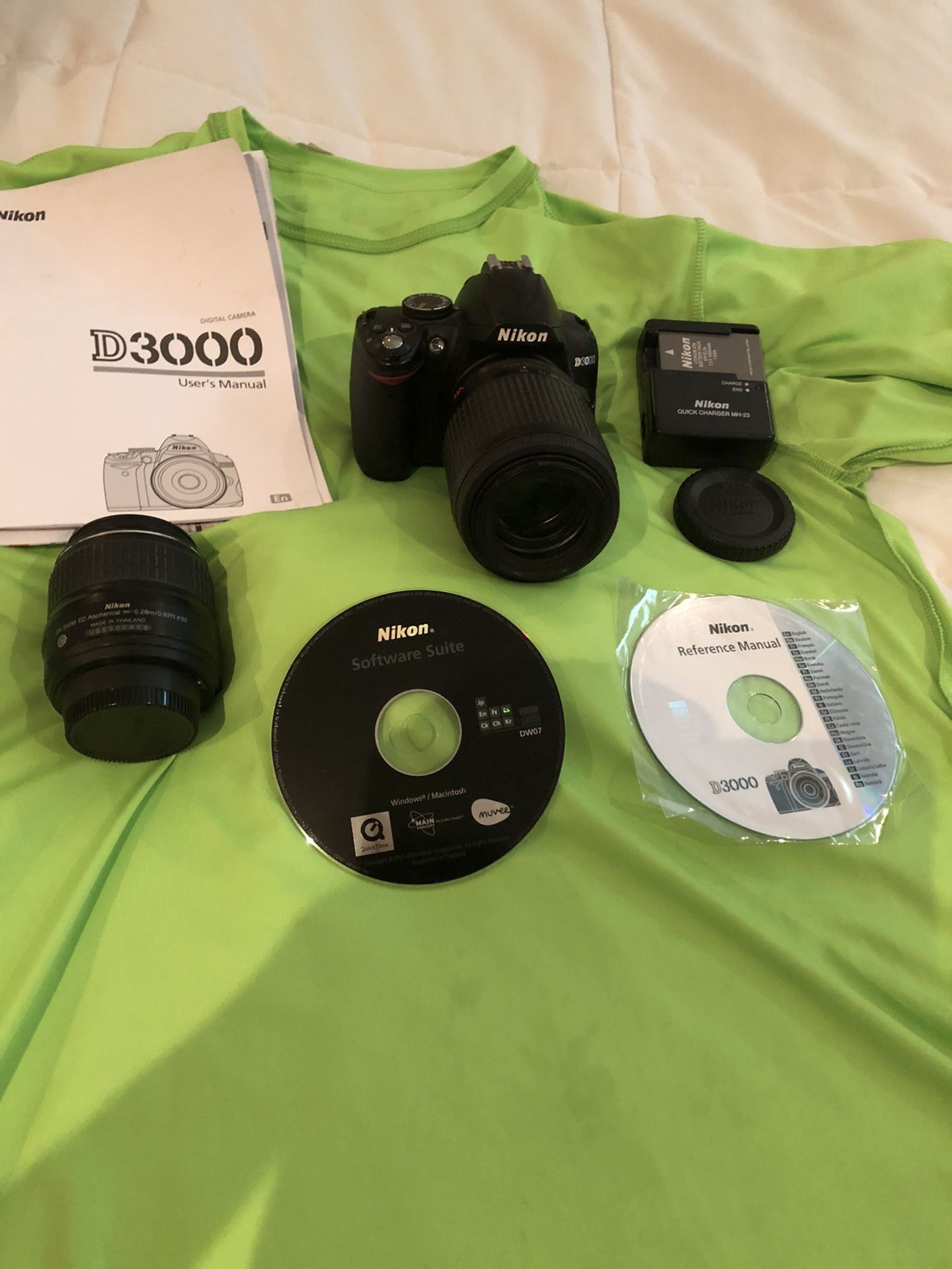 NIKON D3000, lenses, charger battery, editing software, manual