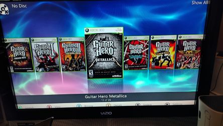 Xbox 360 elite with all guitar hero games