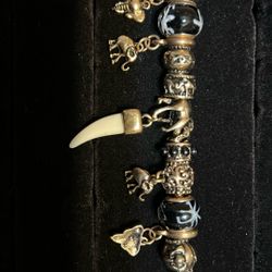 Designer Gold Tone Black Enamel Glass Elephant S Tooth Infinity Knot Charm Bracelet