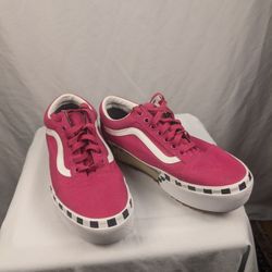 Vans Old Skool Logo Stacked Platform sneakers in a Cabaret Pink color with a checkerboard bumper