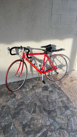  red Cannondale CAAD road bike,  1990s