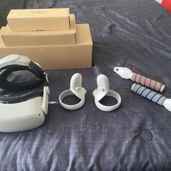 Oculus Quest 2 w/ Box, Headstrap, & Beat Saber Handles – Good Condition