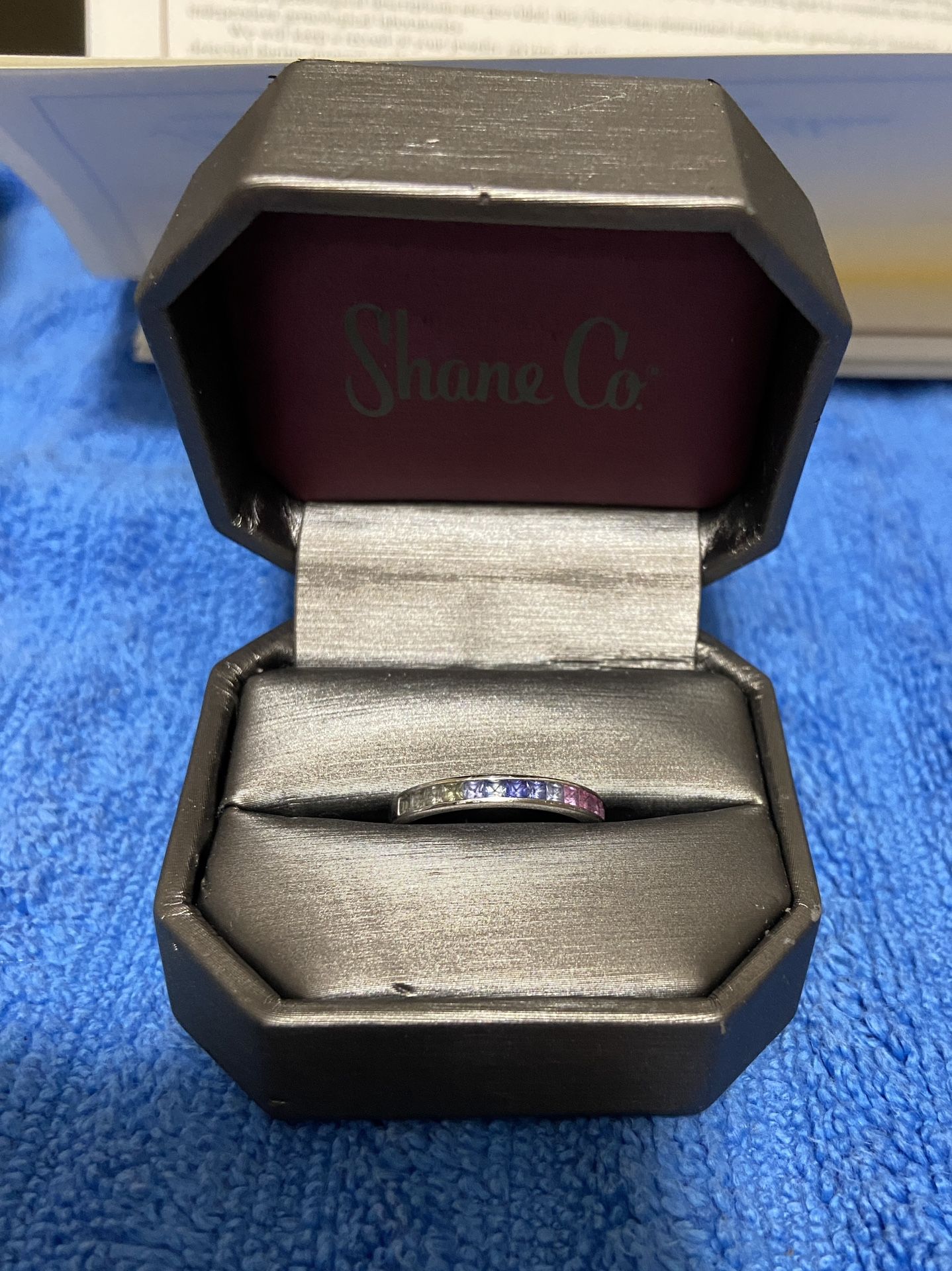 Shane Co. FASHION RING IN 14K WHITE GOLD WITH TWENTY THREE MULTI COLORED PRINCESS CUT SAPPHIRES
