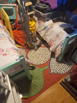 2 twin beds / bunk beds with mattress and bedding
