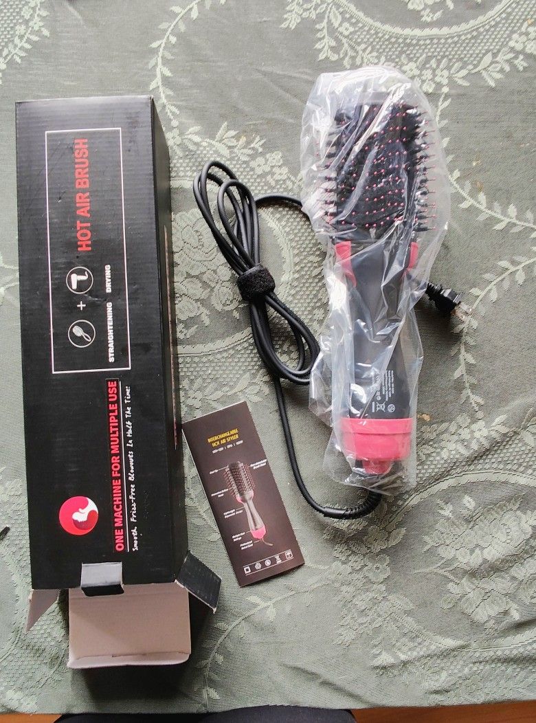 Duel Hair Dryer And Straightener Brush.