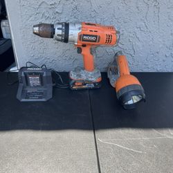 Rigid Drill And Flashlight Comes With Battery And Charger
