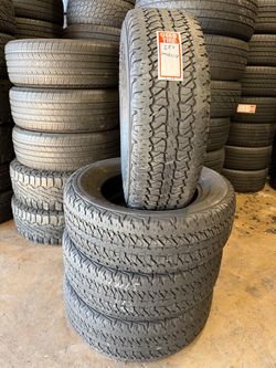 245/65R17 Firestone A/T full tires set