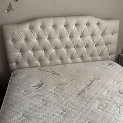 Full bed frame with a mattress