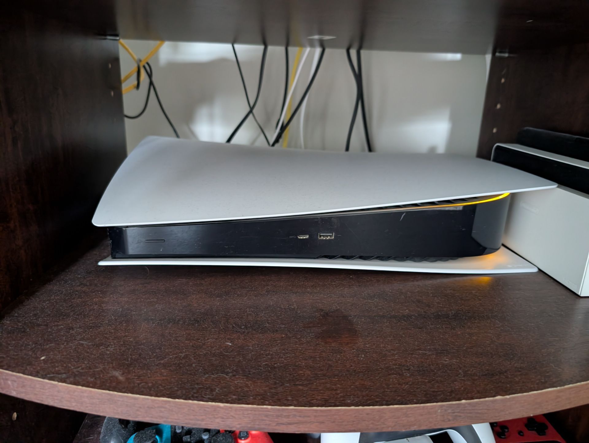 PlayStation 5 with 2 controllers and charging station