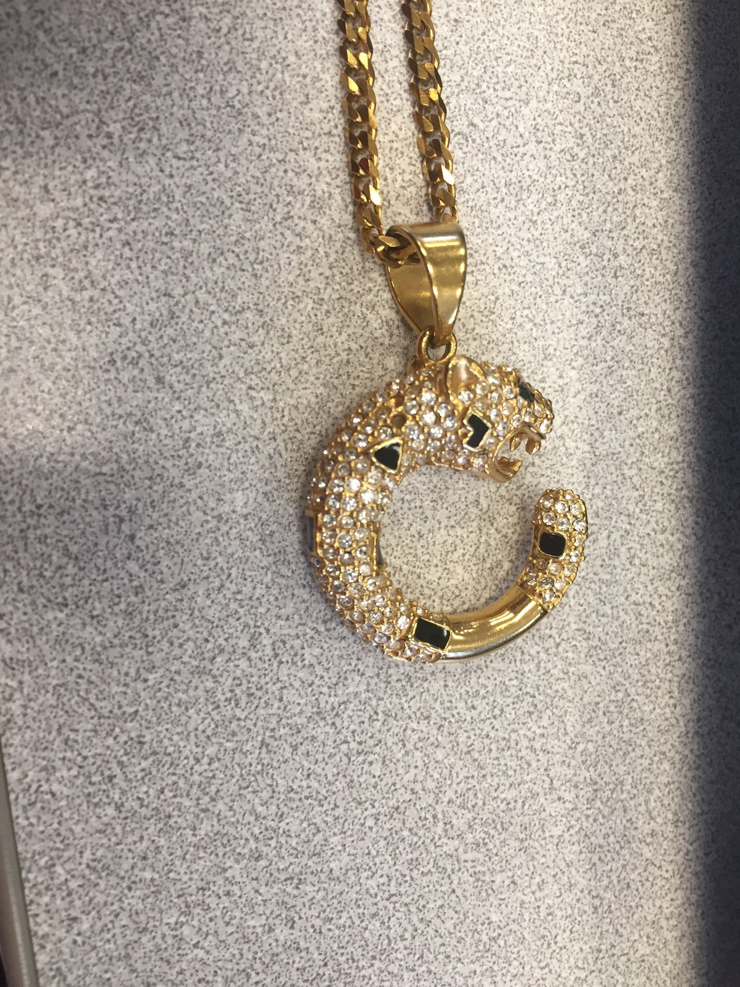 Gold chain with panther pendant