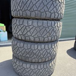 (4) 295/60R20 Nitto Ridge Grappler 
