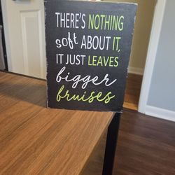 There's Nothing Soft About It, It Just Leaves Bigger Bruises Sign