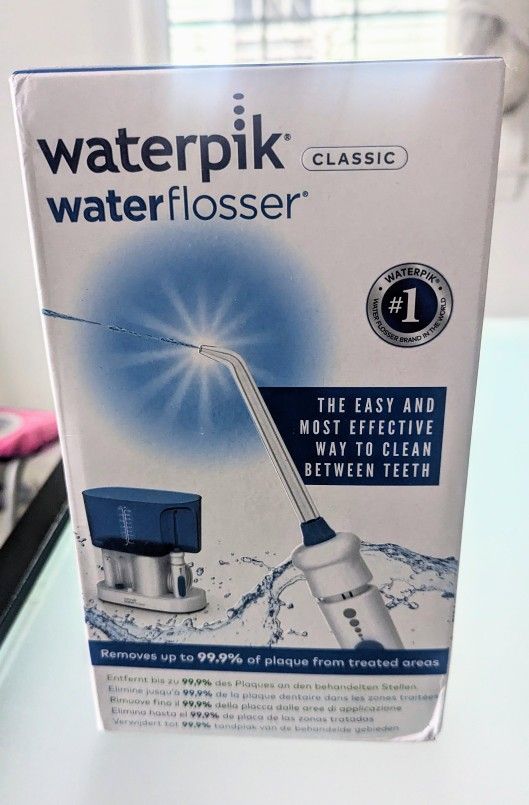 Brand New In box- Waterpik/Waterflosser