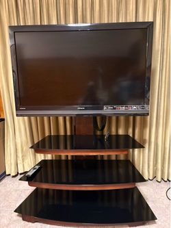 Hitachi Tv  with a  beautiful stand