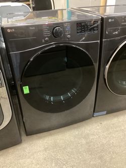 LG 7.4 cu.ft. Vented Smart Stackable Electric Dryer with TurboSteam and Sensor Dry New Scratch and Dent