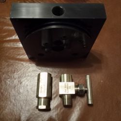 1/2" Center Pressure Dual Side Return Black Anodized Lowrider Hydraulic Pump Block with Slow Down And Check Valve