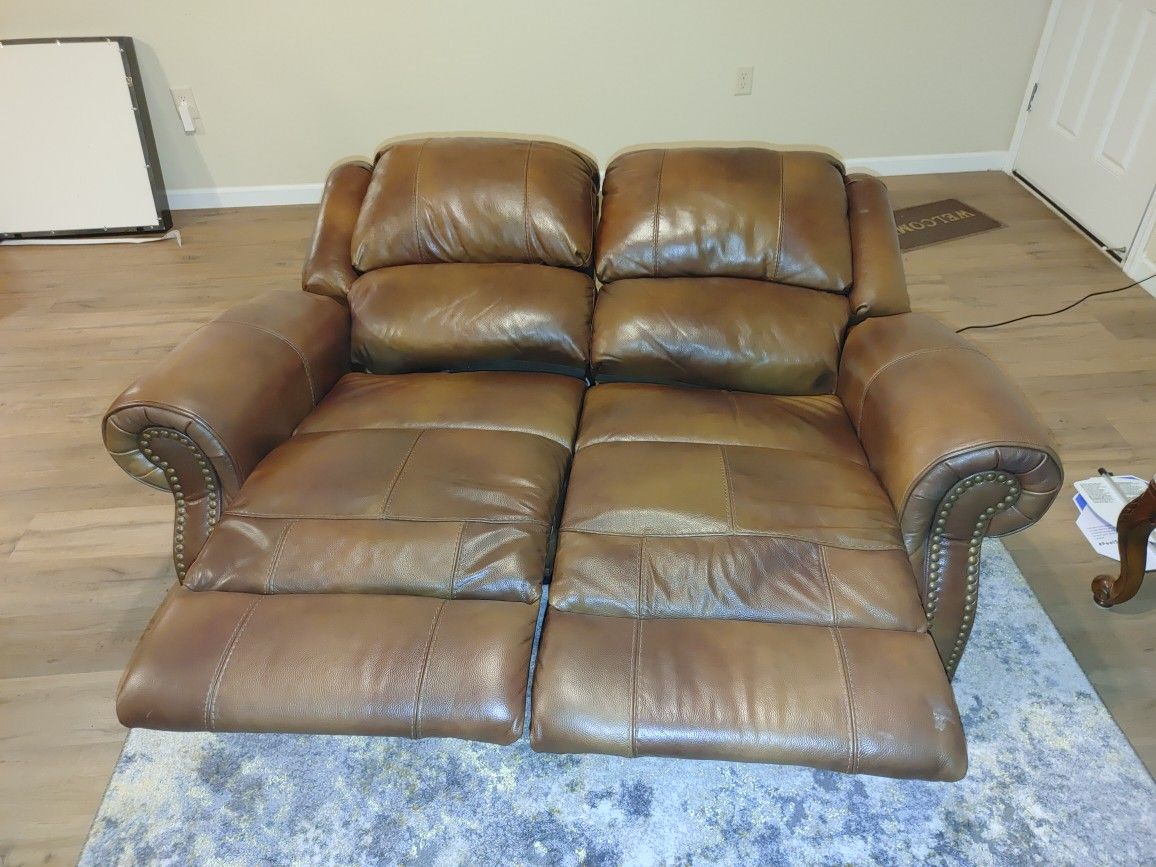 In STORAGE, Ready For Pick-up!  Reclining love seat Powered