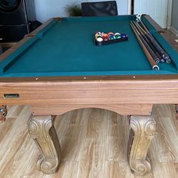 Pool Table With 5 Sticks And Wall Hanger And Balls