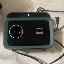 Like New Video Projector NISOO 4k WiFi6 Bluetooth Portable 360 Rotating Ok For Outdoor