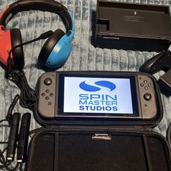 NINTENDO SWITCH WITH MEM CARD, DOCKING STATION, HDMI, HEADPHONES , BAKUGAN GAME AND JOYCON GRIP