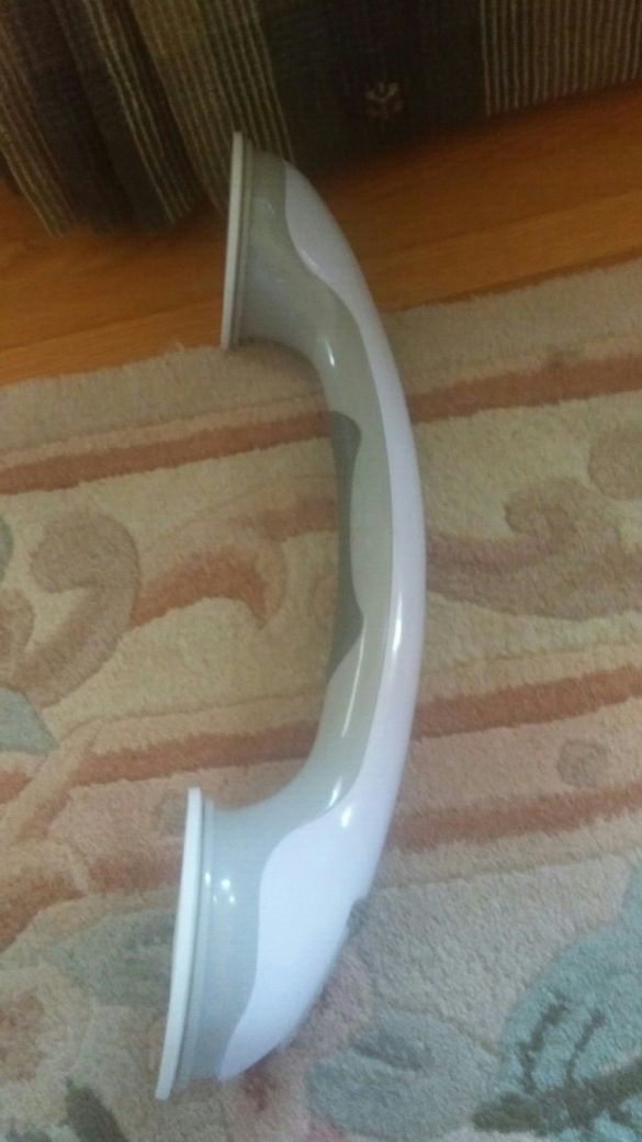 Shower hand grip and hand towel holder