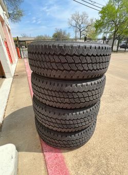 LT275/65/R20 Bridgestone dueler all-terrain 10 ply load range E Chevy Gmc Ford Rims
