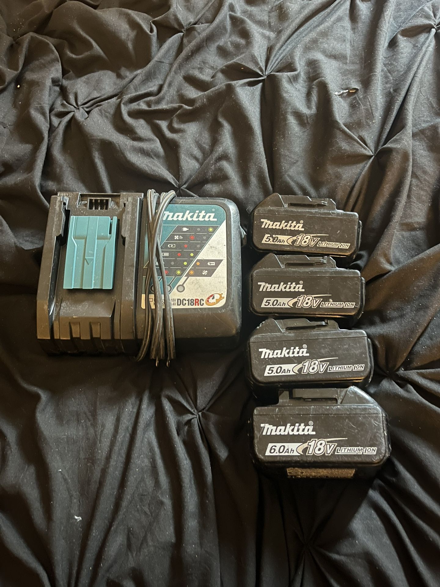 Makita charger With Three 5.0 batteries One 6.0 battery
