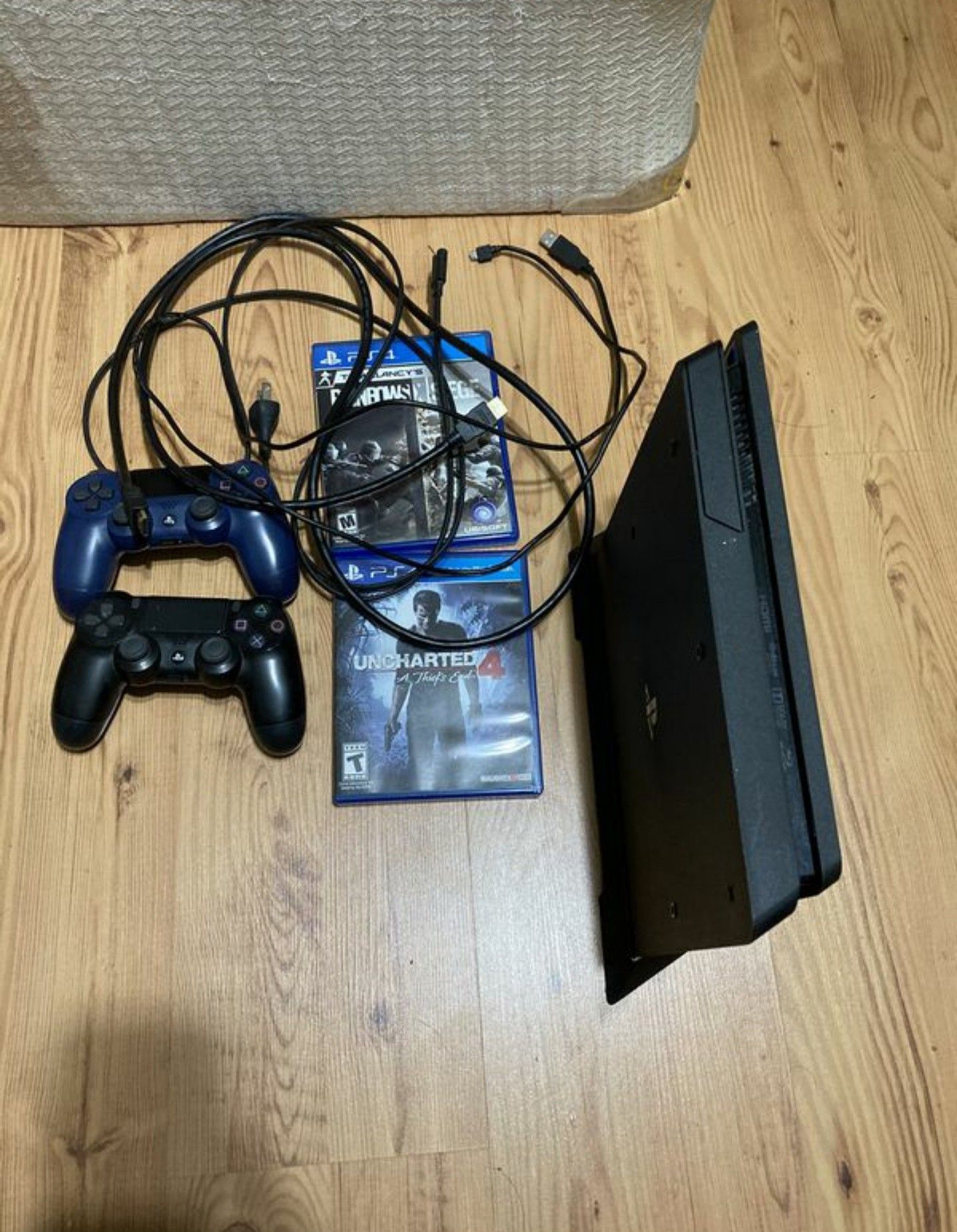 PS4 Slim with 2 controllers!!! And 2 games