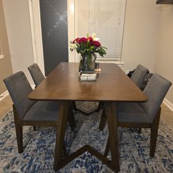 Nema Rectangular 59.1" L x 35.5" W Dining Set with 4 chairs By George Oliver