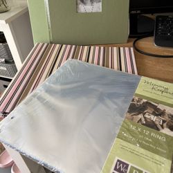 Two Scrapbooks 12x12” With 25 Extra Sheets. 