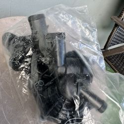 Volkswagen Water pump/Thermostat Assembly