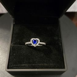 New Size 6 Sapphire blue sterling silver 925 heart shaped ring. Comes in its Light-up ring box.

