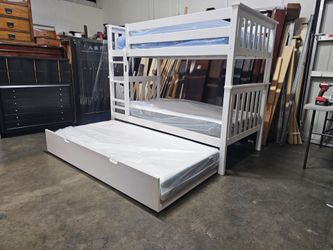 Twin over twin bunk bed and trundle