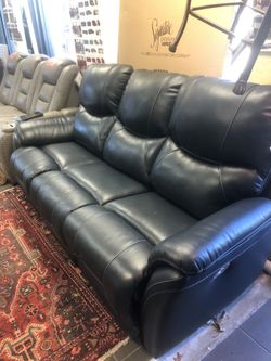 Genuine leather power reclining sofa