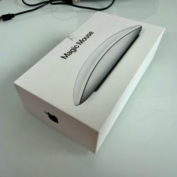 new Apple Magic Mouse. Never used and in perfect condition. Includes the mouse only no charger with original box