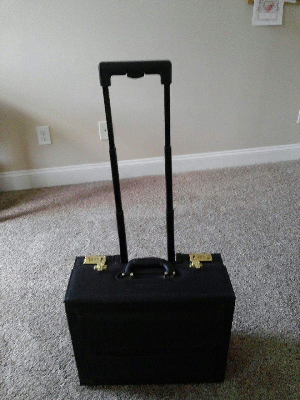 REDUCED!!!Rolling, locking, briefcase with telescoping handle and wheels