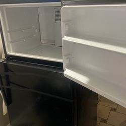 NEED GONE ASAP (WILL DELIVER).Refrigerator And  Matching Black Microwave To Go With It  And Dishwasher And Oven All  Black Everything. 