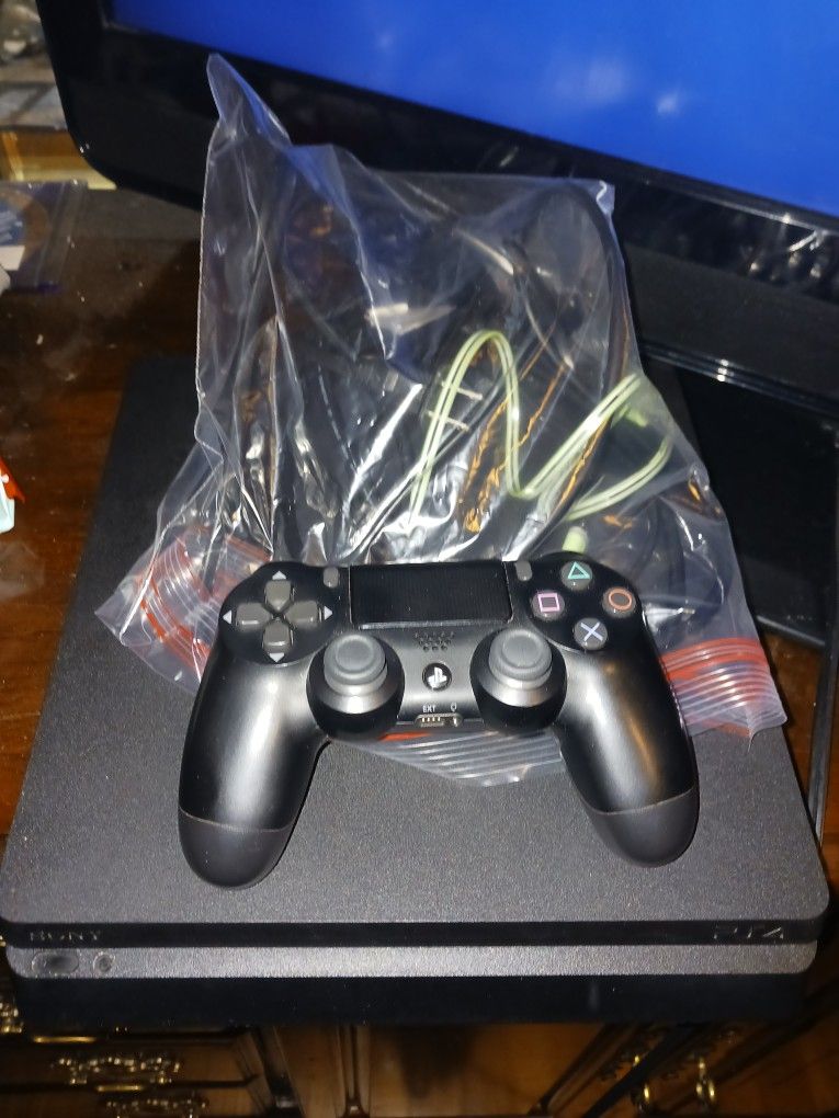 Ps4 Slim 1tb. Games Sold Separately. Extra Controller Available.