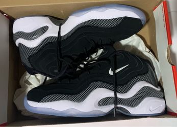 The Nike Air Zoom Flight 96 Black Metallic Silver Jason Kidd sneakers in size 8.5 excellent condition worn once comes with original box only flaw is a