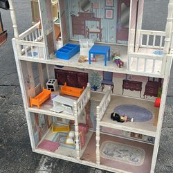 Kids dollhouse with some furniture