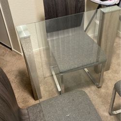 GLASS TABLE AND CHAIRS