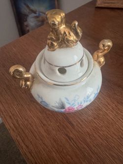 Vintage pottery piece dog gold plate