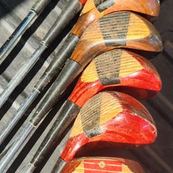 8 vintage wooden Golf clubs OBO