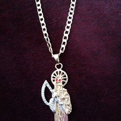 Gold plated -- Santa Muerte en Chapa de Oro