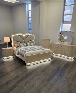 Complete luxury bedroom set, beautiful. Brand new. Ask for price. $100 down payment. Queen or King bed.