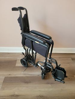Folding Transport Wheelchair with Footrests Brand new