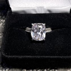 Large lavender cushion cut  Costume Ring With solitaire with side stones and a hidden halo with stones. Absolutely beautiful.