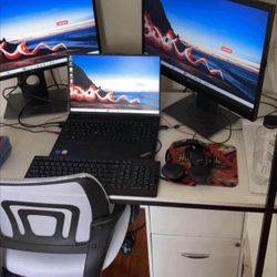 Entire computer set up-including desk, chair, cabinet, docking station, keyboard, mouse, monitors.